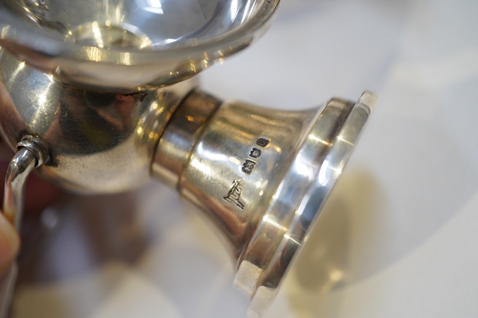An Edwardian novelty cigar cutter and perpetual lighter, modelled as a pair of railway lamps, by Walker & Hall